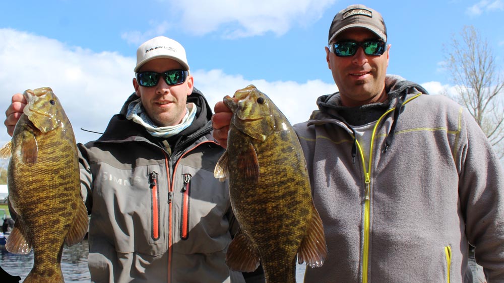 Scott and Jay holding bass at Falcon Lake fishing tournament
